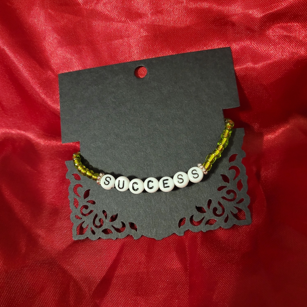 Beaded Bracelet with 'Success' Charm